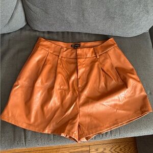 Shinestar High Waist Orange Faux Leather Shorts